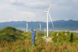 Apple-launched China Clean Energy Fund invests in three wind farms